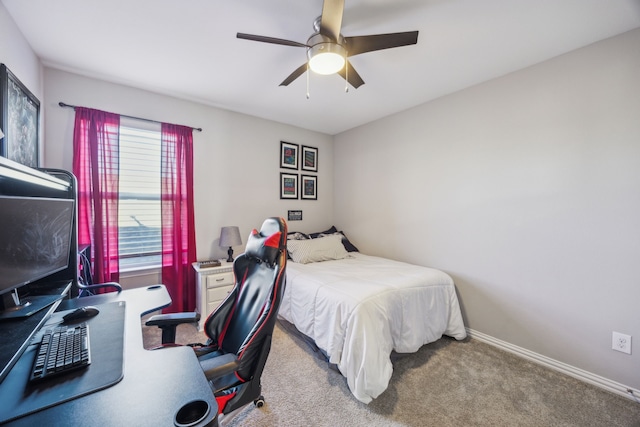 bedroom featuring a ceiling fan, carpet flooring, and baseboards