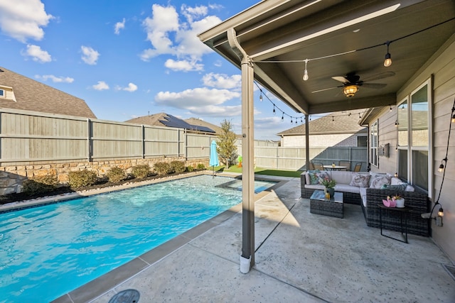 view of pool with a fenced in pool, a patio, ceiling fan, a fenced backyard, and outdoor lounge area