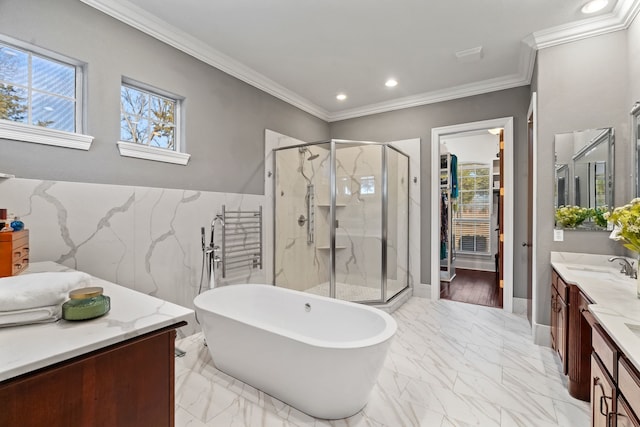 bathroom featuring recessed lighting, vanity, marble finish floor, a soaking tub, and a stall shower