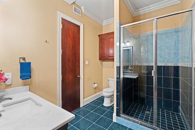 full bathroom featuring a stall shower, toilet, tile patterned flooring, crown molding, and vanity