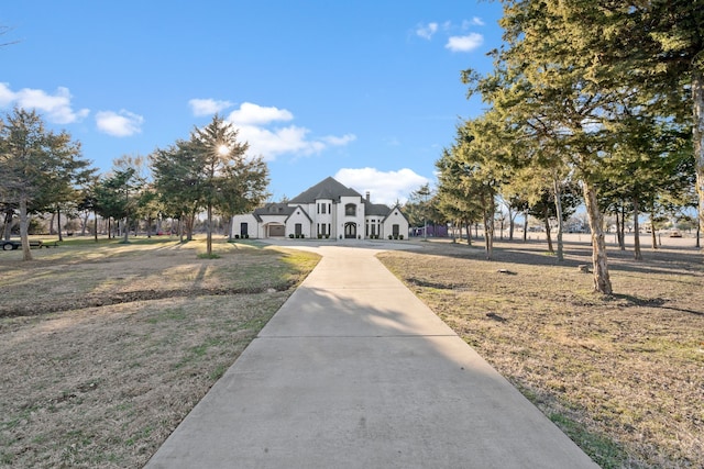 view of community featuring a lawn