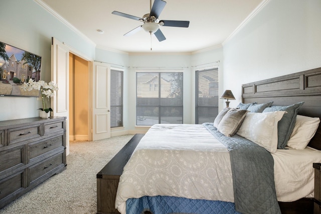 bedroom with crown molding, ceiling fan, and light colored carpet