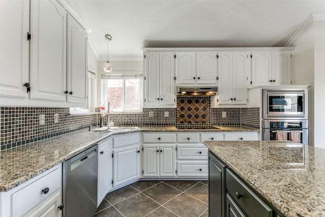 kitchen with backsplash, crown molding, light stone countertops, stainless steel appliances, and a sink