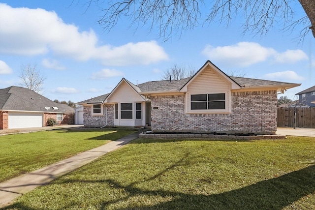 single story home featuring a garage, brick siding, a front yard, and fence