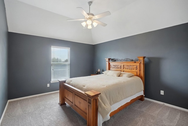 bedroom featuring vaulted ceiling, carpet flooring, a ceiling fan, and baseboards