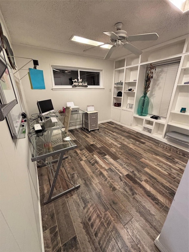 office with a textured ceiling, a ceiling fan, and wood finished floors