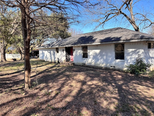 view of front of house with crawl space, brick siding, roof with shingles, and entry steps