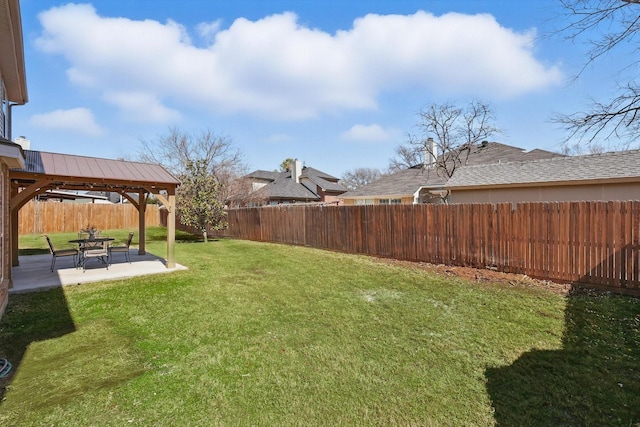 view of yard with a gazebo, a fenced backyard, and a patio