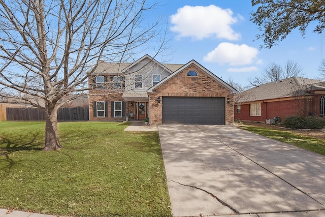 traditional home featuring brick siding, concrete driveway, fence, a garage, and a front lawn