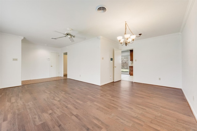 unfurnished room with baseboards, visible vents, wood finished floors, crown molding, and ceiling fan with notable chandelier