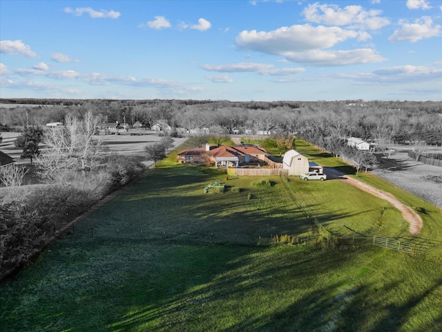 birds eye view of property featuring a rural view