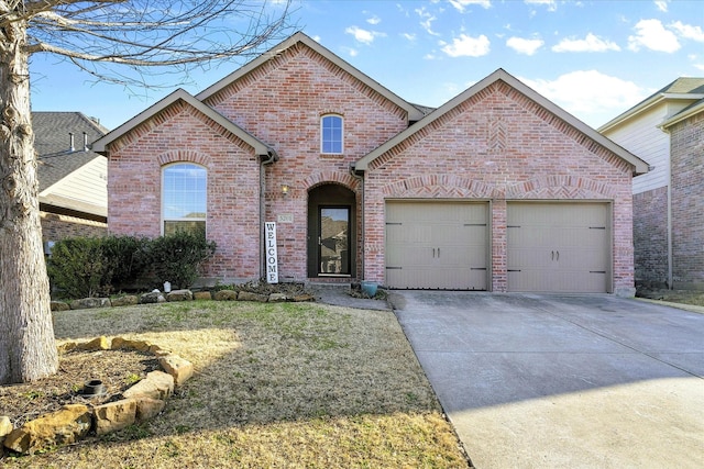 view of front of property with a front yard, brick siding, driveway, and an attached garage