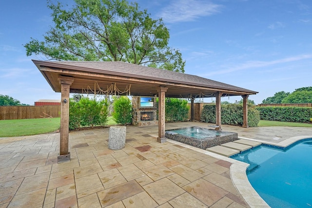 9577 Vail Eton Dr, Pilot Point, TX 76258 - view of swimming pool with a gazebo, an outdoor stone fireplace, a fenced backyard, and a patio area