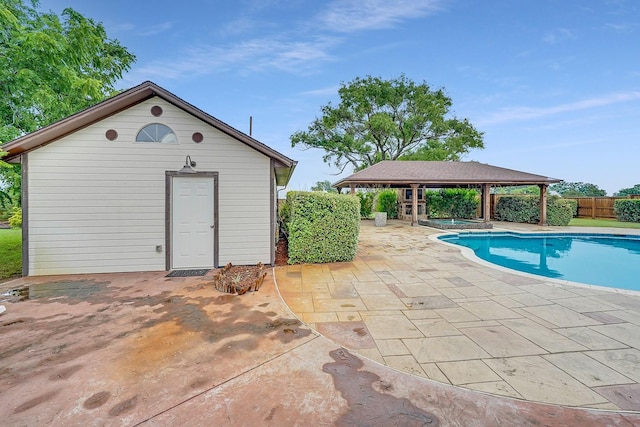 9577 Vail Eton Dr, Pilot Point, TX 76258 - view of swimming pool featuring a patio area, a gazebo, and an outdoor structure