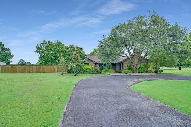 9577 Vail Eton Dr, Pilot Point, TX 76258 - view of front of home featuring asphalt driveway