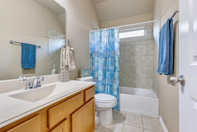 full bathroom featuring toilet, vanity, vaulted ceiling, tile patterned floors, and shower / bath combo with shower curtain