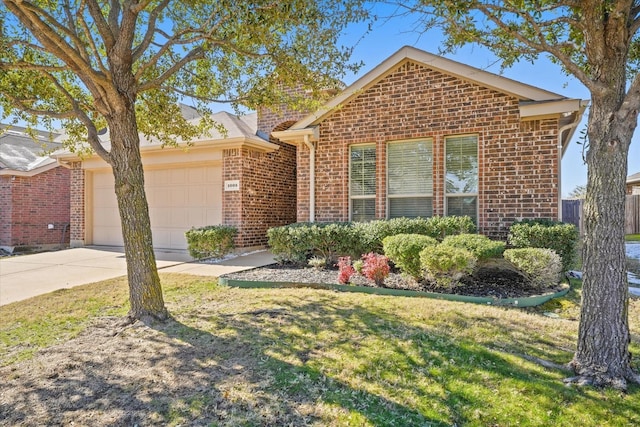 ranch-style house with a front yard, brick siding, driveway, and an attached garage