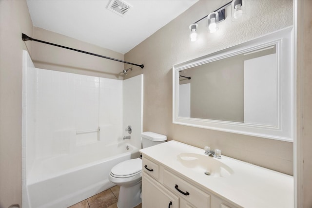 bathroom with visible vents, bathing tub / shower combination, toilet, tile patterned flooring, and vanity