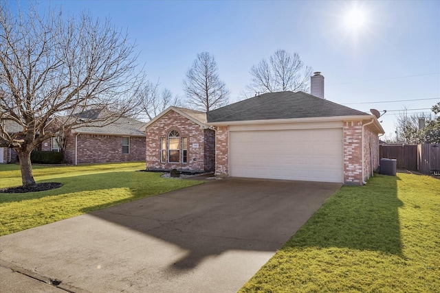 single story home with an attached garage, cooling unit, brick siding, fence, and a front yard