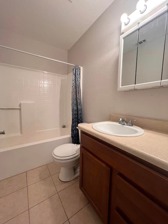 bathroom with visible vents, toilet, tile patterned floors, shower / bath combination with curtain, and vanity