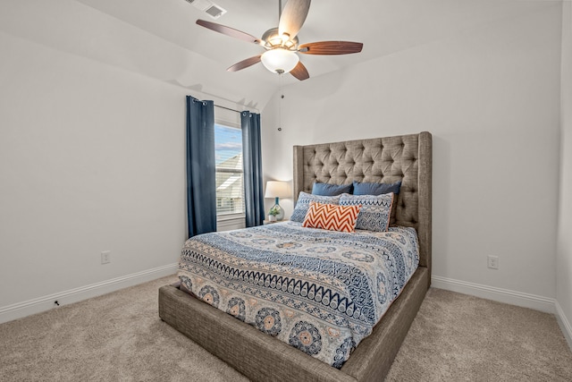 bedroom featuring carpet, visible vents, lofted ceiling, and baseboards