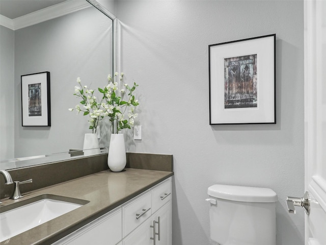 5030 Southern Hills Dr, Frisco, TX 75034 - bathroom with toilet, vanity, and ornamental molding
