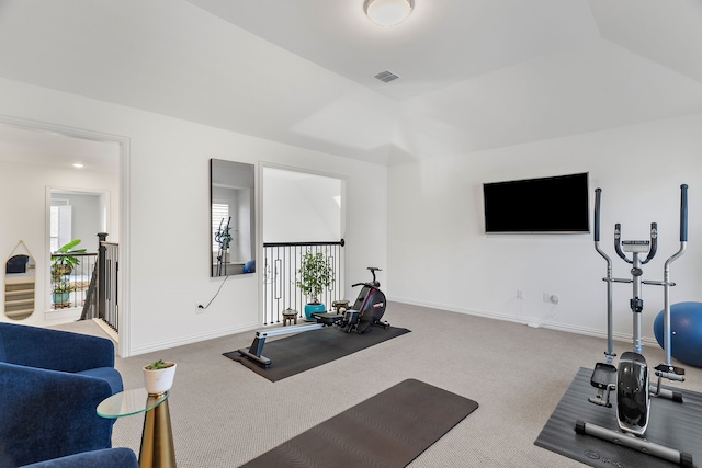 workout area featuring carpet, visible vents, and baseboards