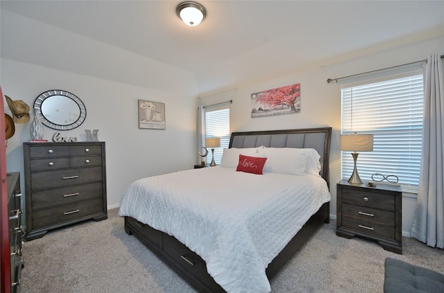 bedroom with carpet and baseboards