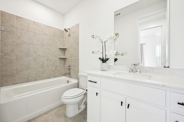 full bathroom featuring tile patterned flooring, toilet, visible vents, vanity, and shower / washtub combination