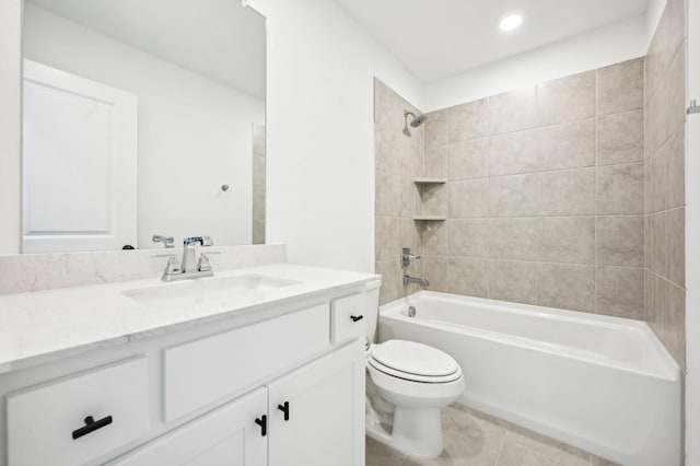 bathroom with toilet, bathtub / shower combination, and vanity