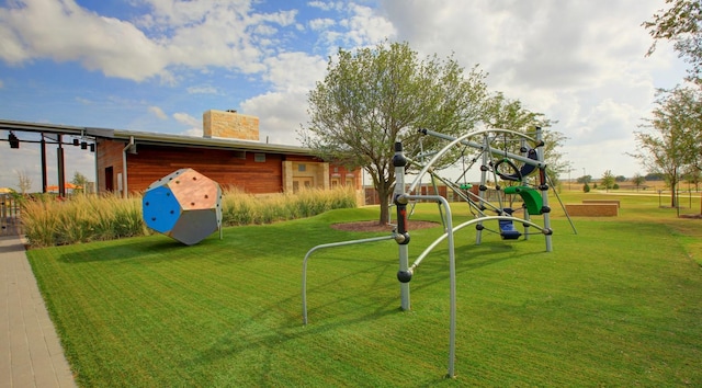 surrounding community with playground community and a lawn