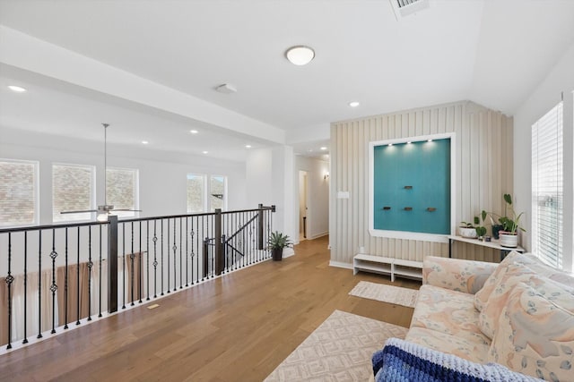 sitting room with visible vents, recessed lighting, lofted ceiling, wood finished floors, and ceiling fan