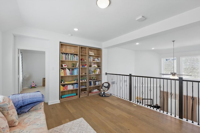 sitting room featuring wood finished floors, recessed lighting, and ceiling fan
