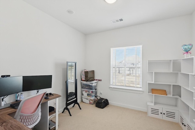 office area featuring baseboards, carpet flooring, and visible vents