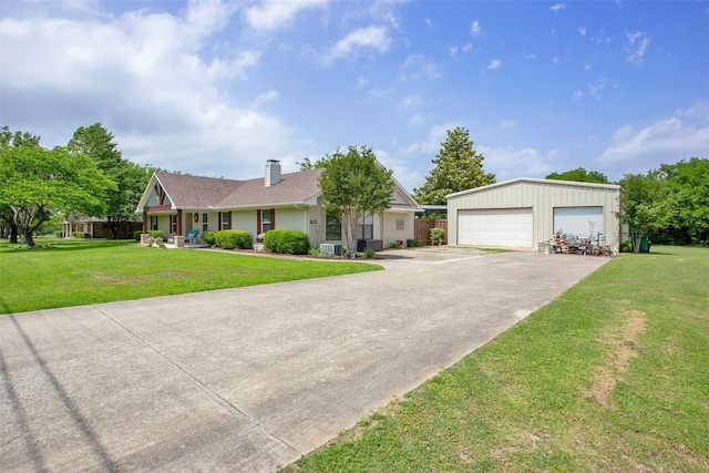 single story home with a garage, a chimney, and a front lawn