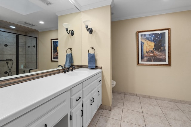 bathroom with a stall shower, visible vents, vanity, and toilet