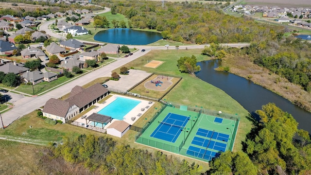 birds eye view of property featuring a water view