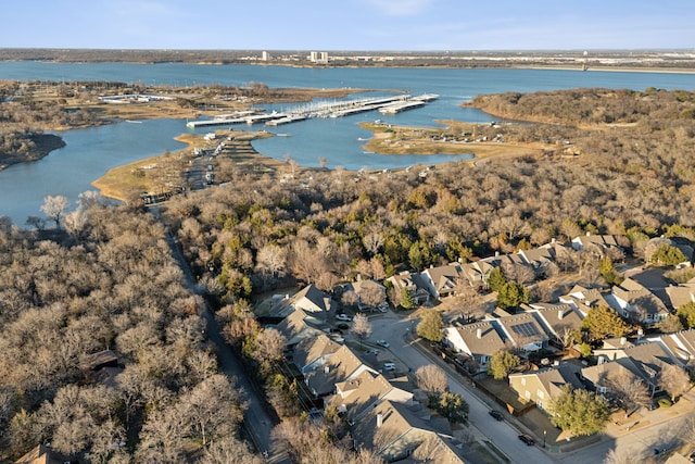 drone / aerial view featuring a water view and a residential view