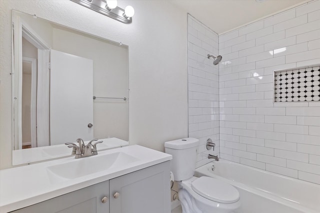 full bath with toilet, washtub / shower combination, and vanity