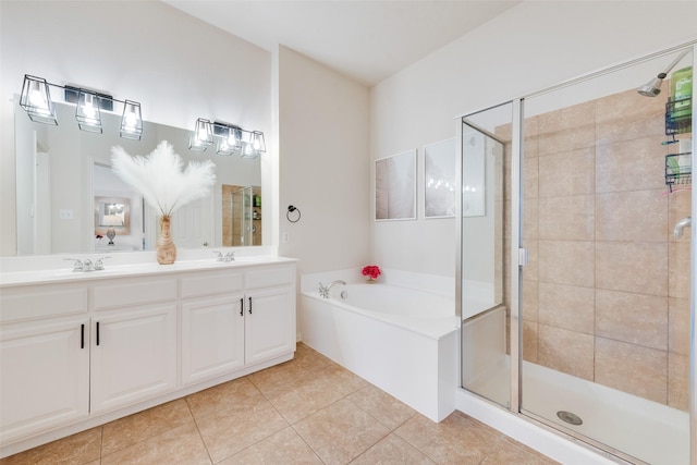 full bathroom with double vanity, a stall shower, tile patterned flooring, and a bath