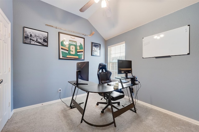 home office featuring carpet flooring, vaulted ceiling, baseboards, and ceiling fan