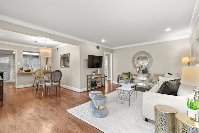 10211 Regal Oaks Dr Unit 121, Dallas, TX 75230 - living area featuring wood finished floors, baseboards, a chandelier, recessed lighting, and ornamental molding