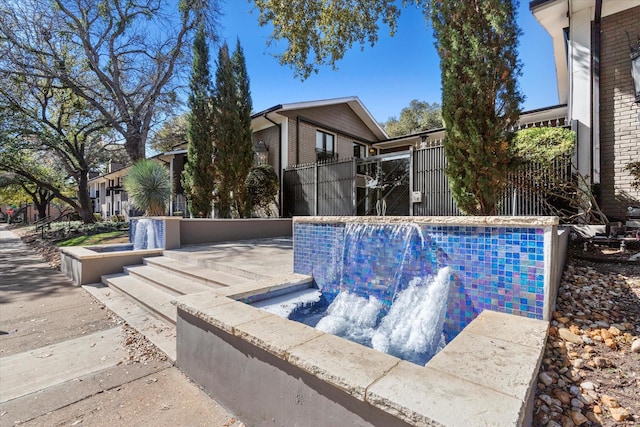 10211 Regal Oaks Dr Unit 121, Dallas, TX 75230 - view of swimming pool