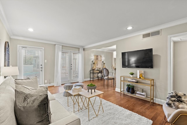 10211 Regal Oaks Dr Unit 121, Dallas, TX 75230 - living room with ornamental molding, wood finished floors, recessed lighting, baseboards, and french doors
