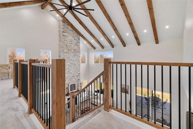 corridor featuring high vaulted ceiling, beamed ceiling, an upstairs landing, and recessed lighting