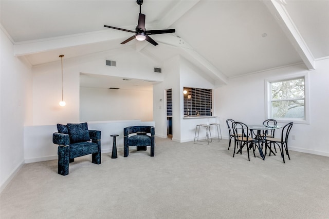 living area featuring visible vents, carpet flooring, beam ceiling, and baseboards