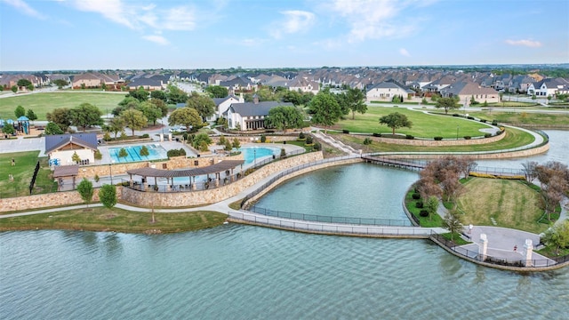 aerial view featuring a water view and a residential view