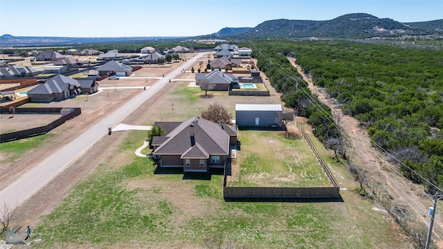 bird's eye view with a residential view and a mountain view