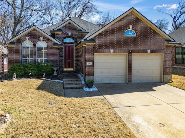 view of front of property with a garage, concrete driveway, brick siding, and roof with shingles