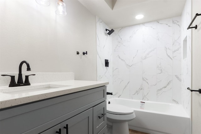 bathroom with toilet, bathing tub / shower combination, recessed lighting, and vanity